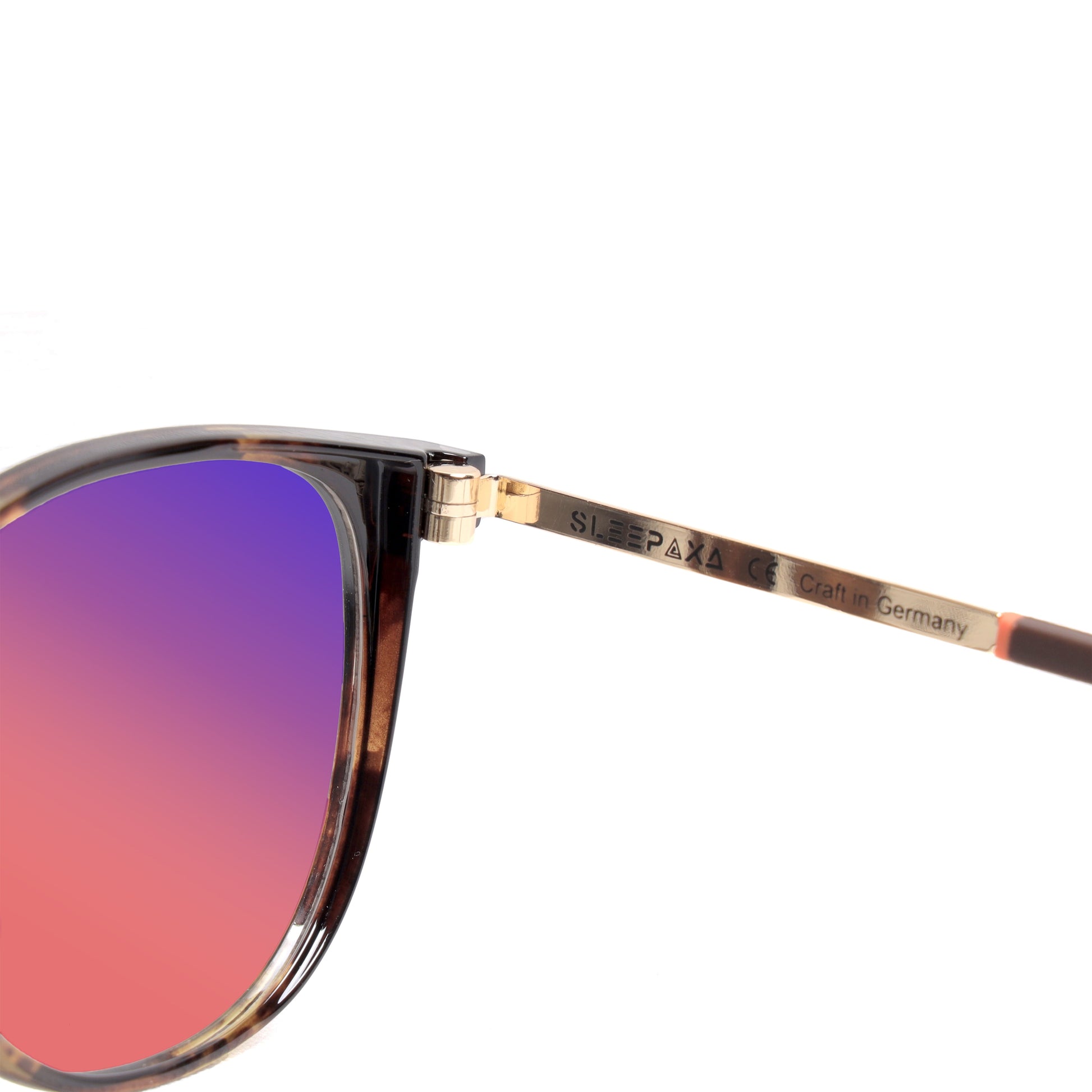 Inside Glasses View of Sleepaxa Voirch FL41 Migraine & Light Sensitivity glasses with Cat Eye Shape Tiger Print frame, rose-tinted lenses, and high-quality Metal temples for optimal comfort and durability