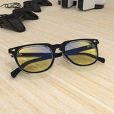 Sleepaxa Elixir Translucent Black gaming & computer glasses with yellow blue-light filter – lifestyle view