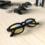 Sleepaxa Grandeur Jet Black gaming & computer glasses with yellow blue-light filter – lifestyle view