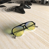 Sleepaxa Opulent Carbon Grey gaming & computer glasses with yellow blue-light filter – lifestyle view