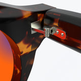 Sleepaxa Mosaic Brown Derby red circadian sleep glasses blocking 100% of light up to 550nm – lens detail view
