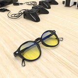 Sleepaxa Mosaic Dark Black gaming & computer glasses with yellow blue-light filter – lifestyle view