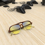 Sleepaxa Opulent Otter Brown gaming & computer glasses with yellow blue-light filter – lifestyle view