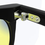 Sleepaxa Solstice Jet Black gaming & computer glasses with yellow blue-light filter – lens detail view