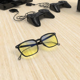 Sleepaxa Solstice Jet Black gaming & computer glasses with yellow blue-light filter – lifestyle view